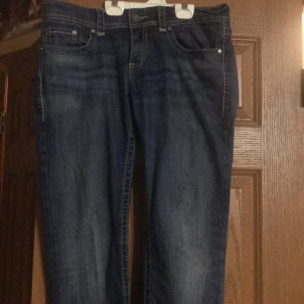 Buckle jeans.